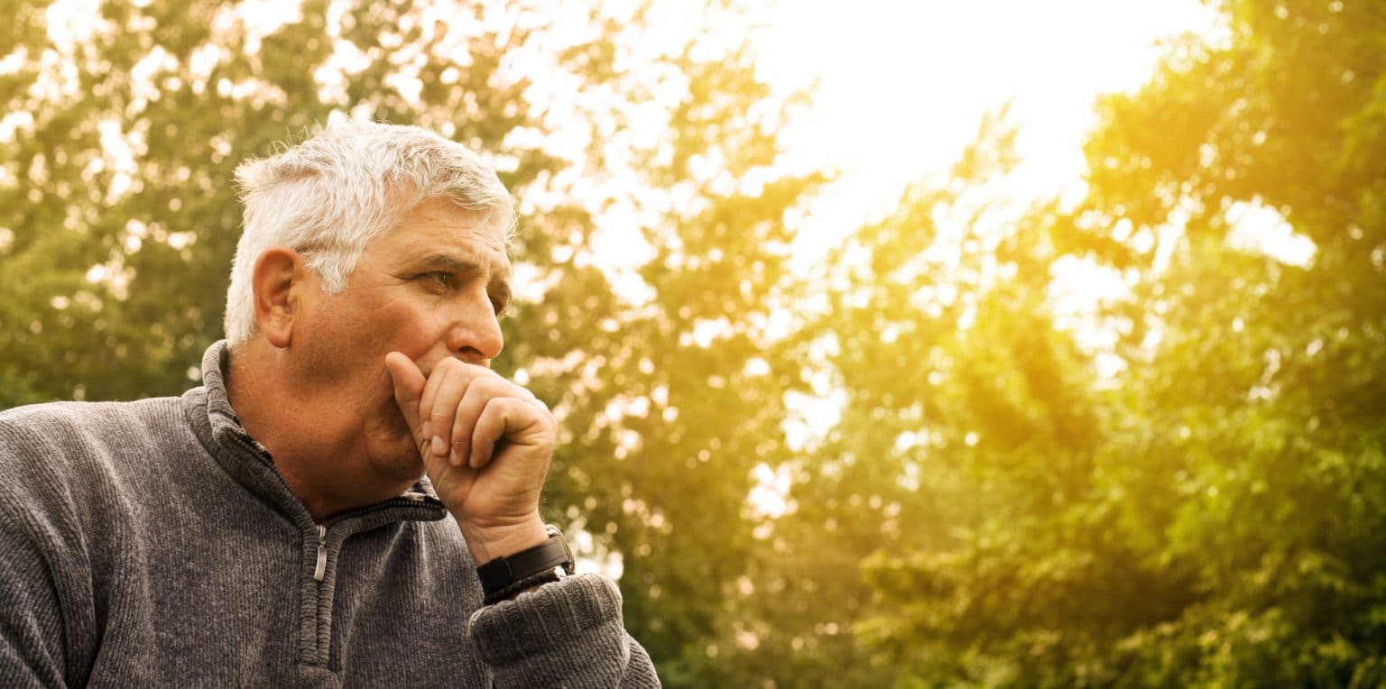 Man having a coughing fit due to undiagnosed chronic cough